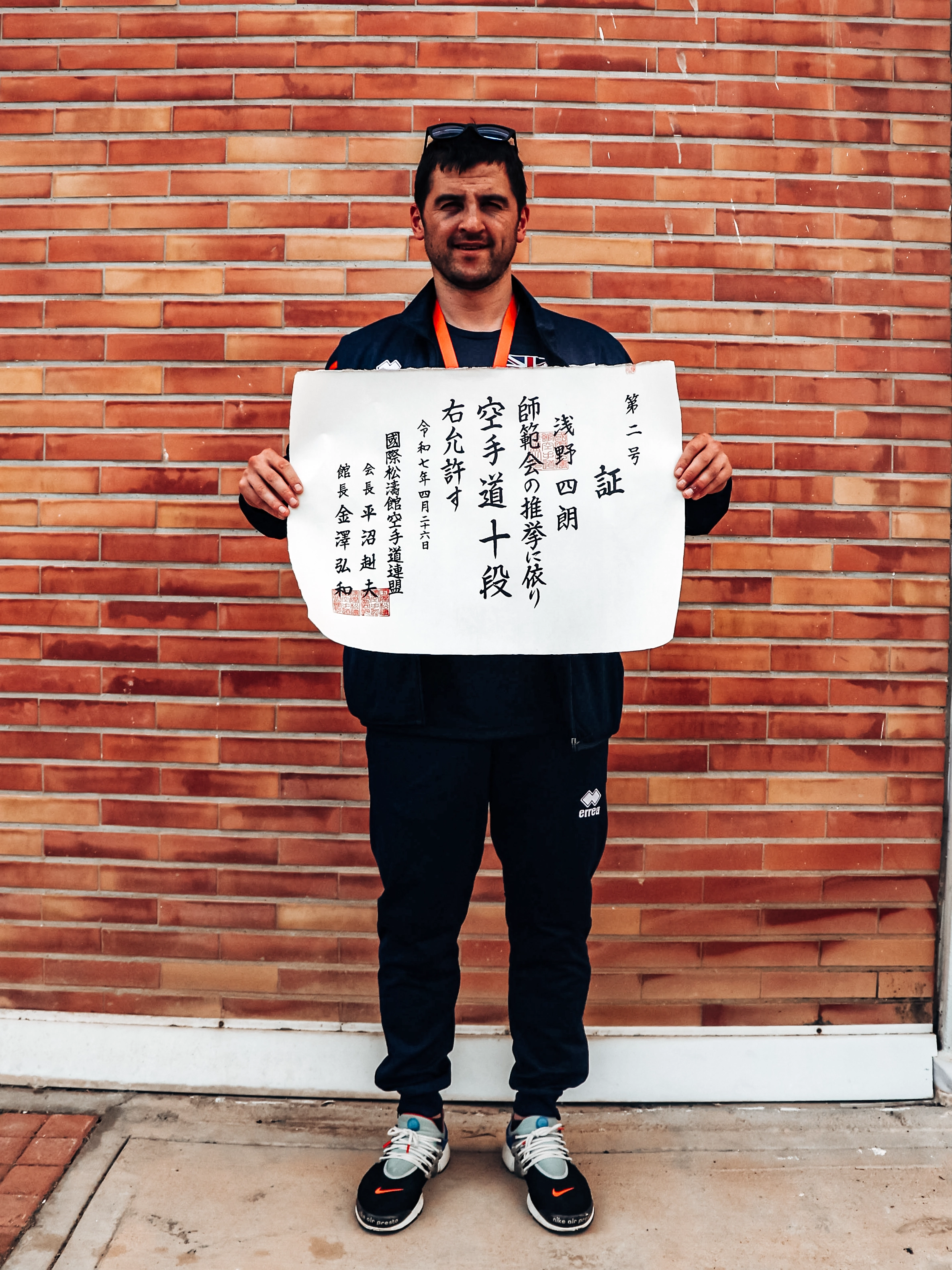 Susumu Asano with Asano Hanshi's Ju Dan Certificate Shiro Asano awarded Ju Dan by SKIF