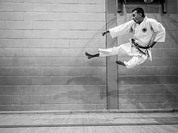 Jumping side thrust karate kick